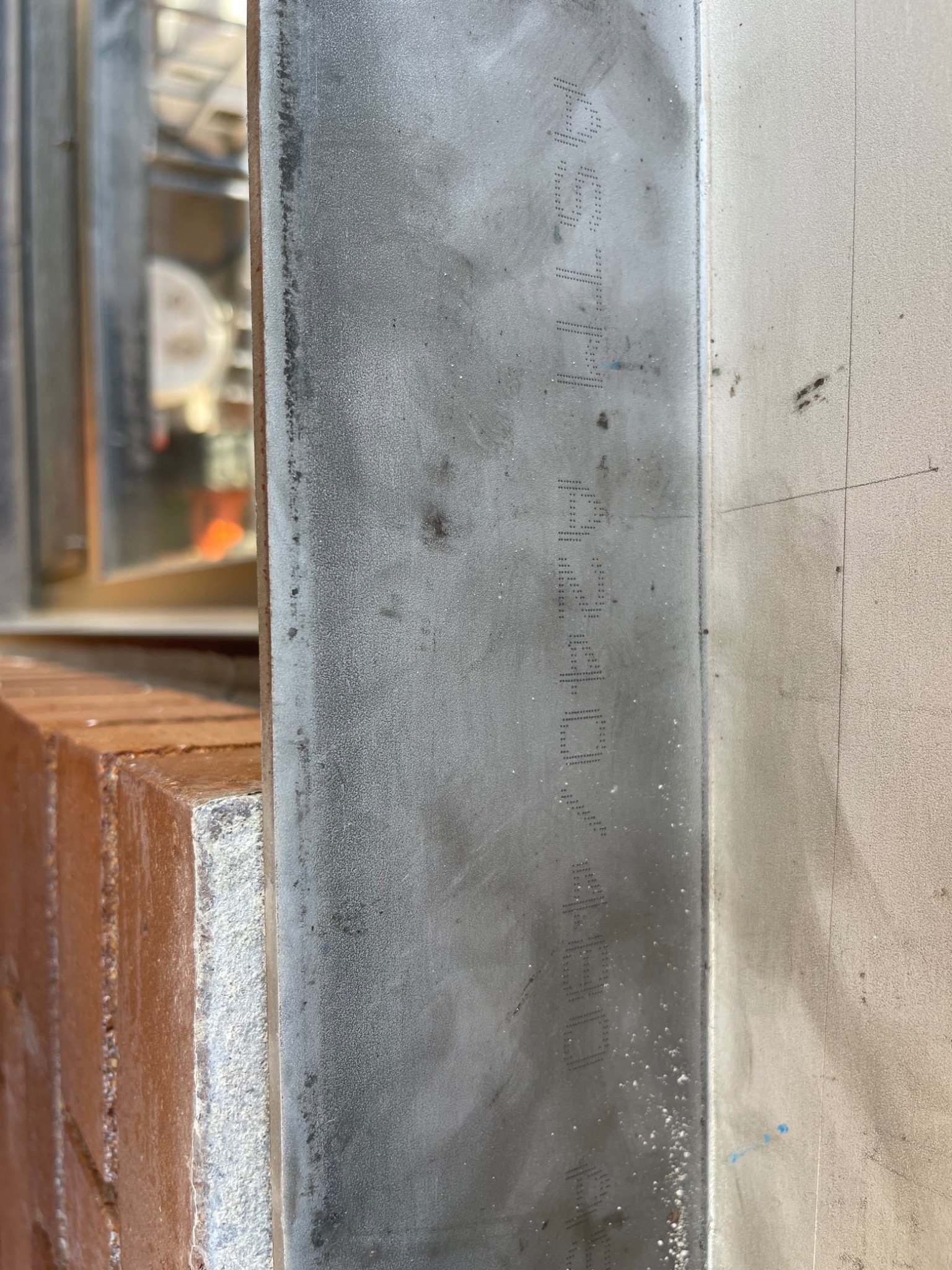 New quarter-inch stainless steel lintel prepared for installation at the Charlottetown armoury