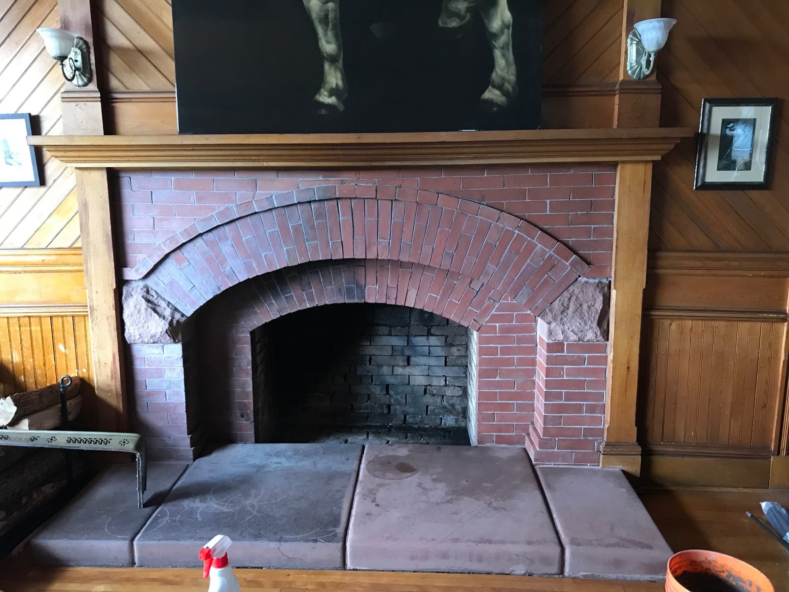 Second historic fireplace at Dalvay by the Sea showing partial soot cleaning