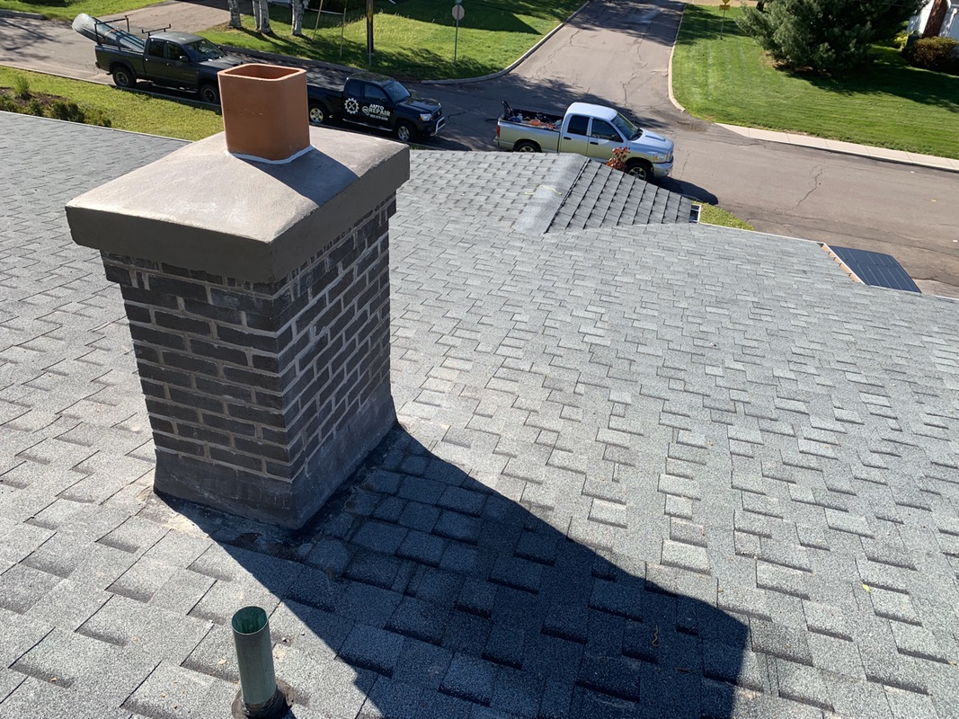 Chimney repair and rebuilding project by DinoMac Masonry