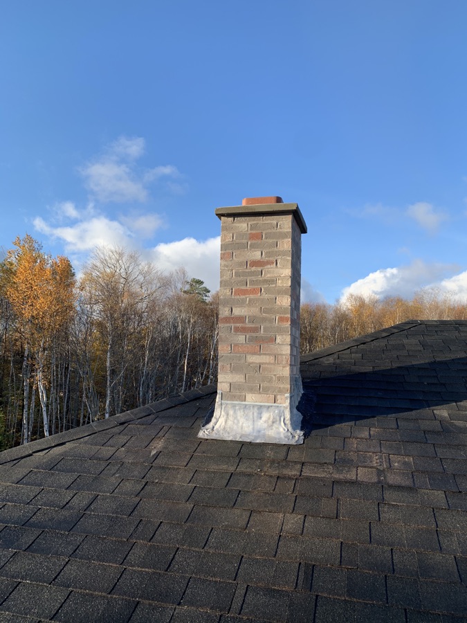 Masonry chimney repair and rebuilding project in PEI