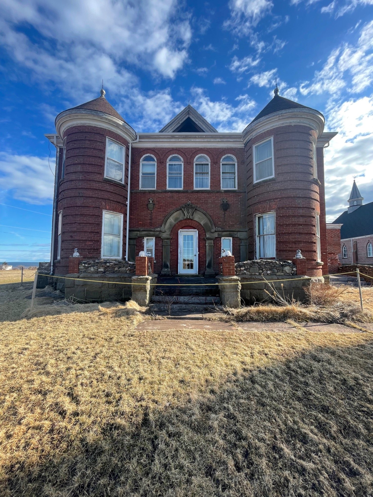 Current exterior of the 1902 Mont-Carmel Parish House in Prince Edward Island
