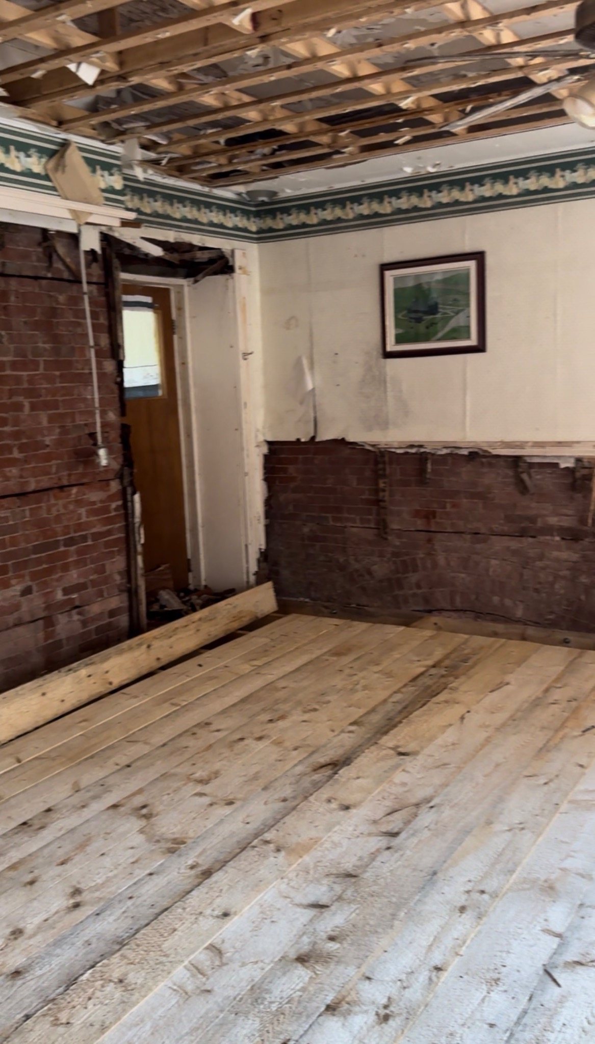 New floor deck installed over replacement framing in the Mont-Carmel Parish House