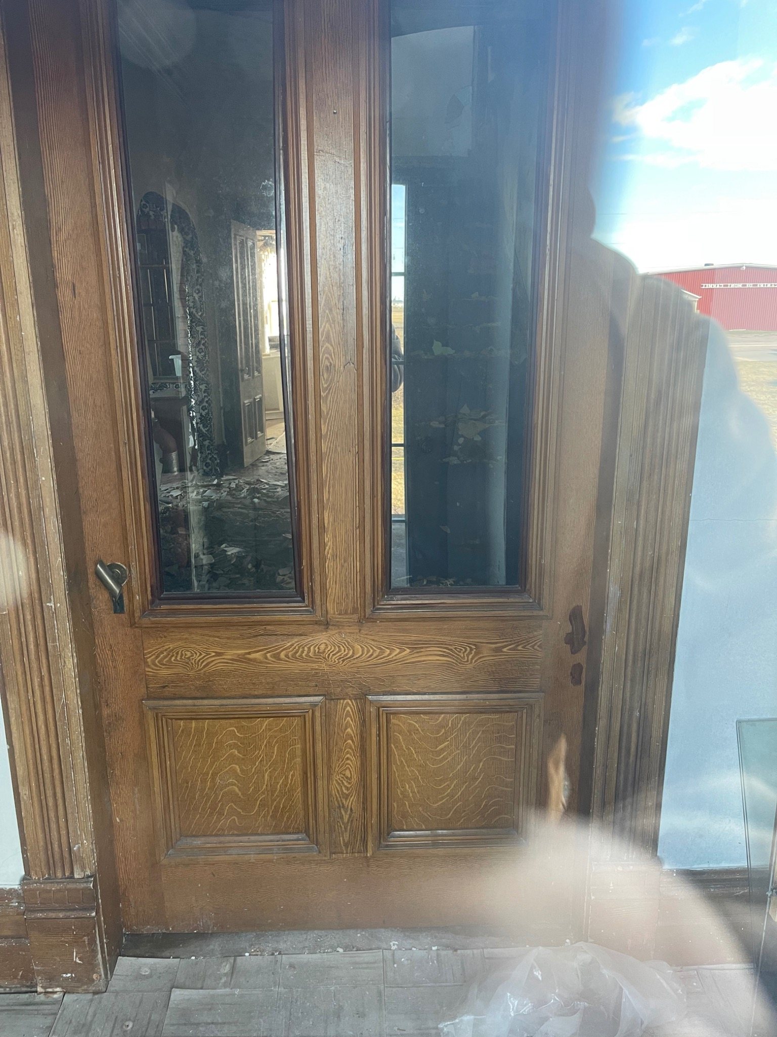 Original tall interior door and trim in the Mont-Carmel Parish House