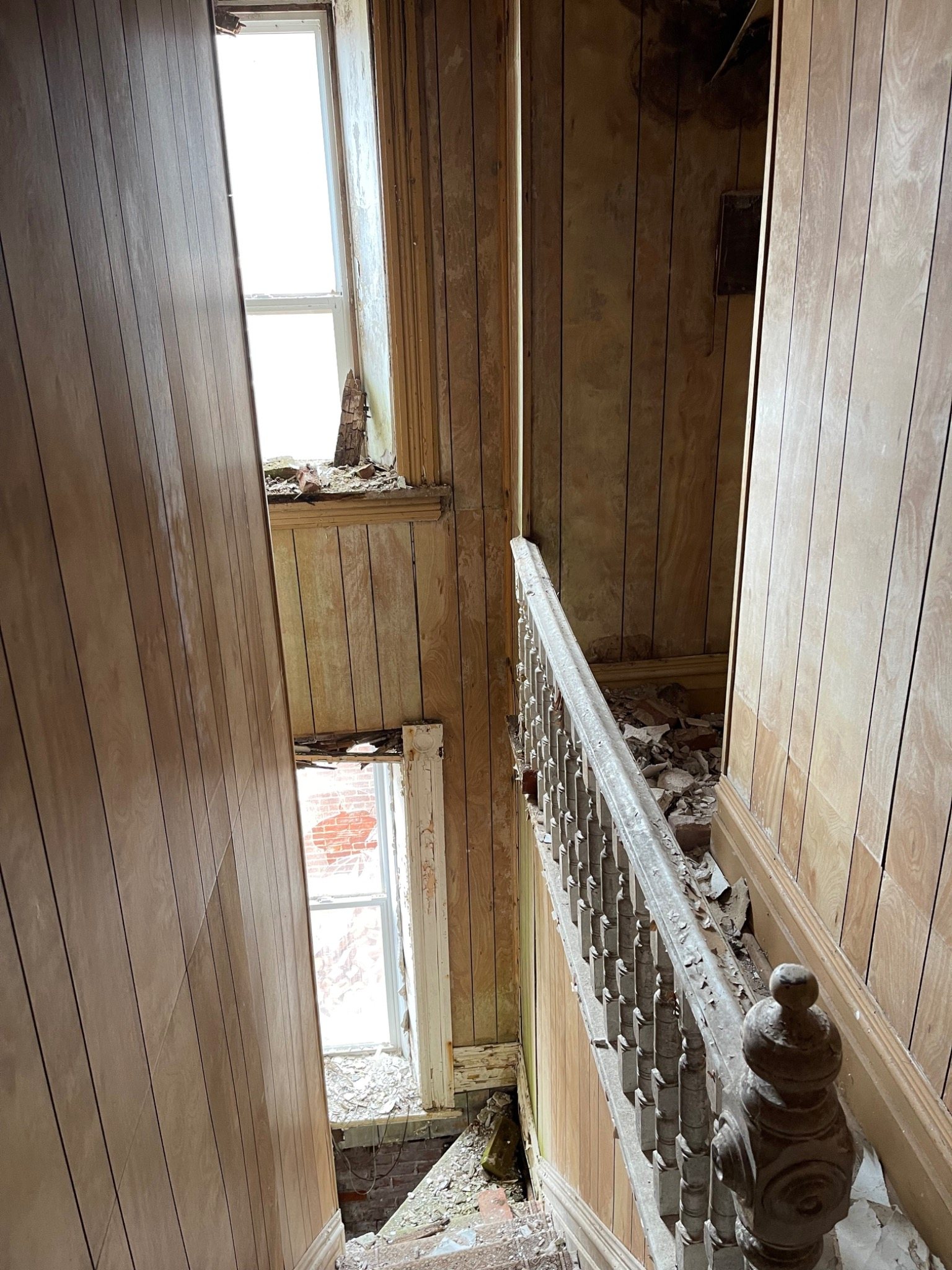 Original interior hall and staircase details inside the Mont-Carmel Parish House