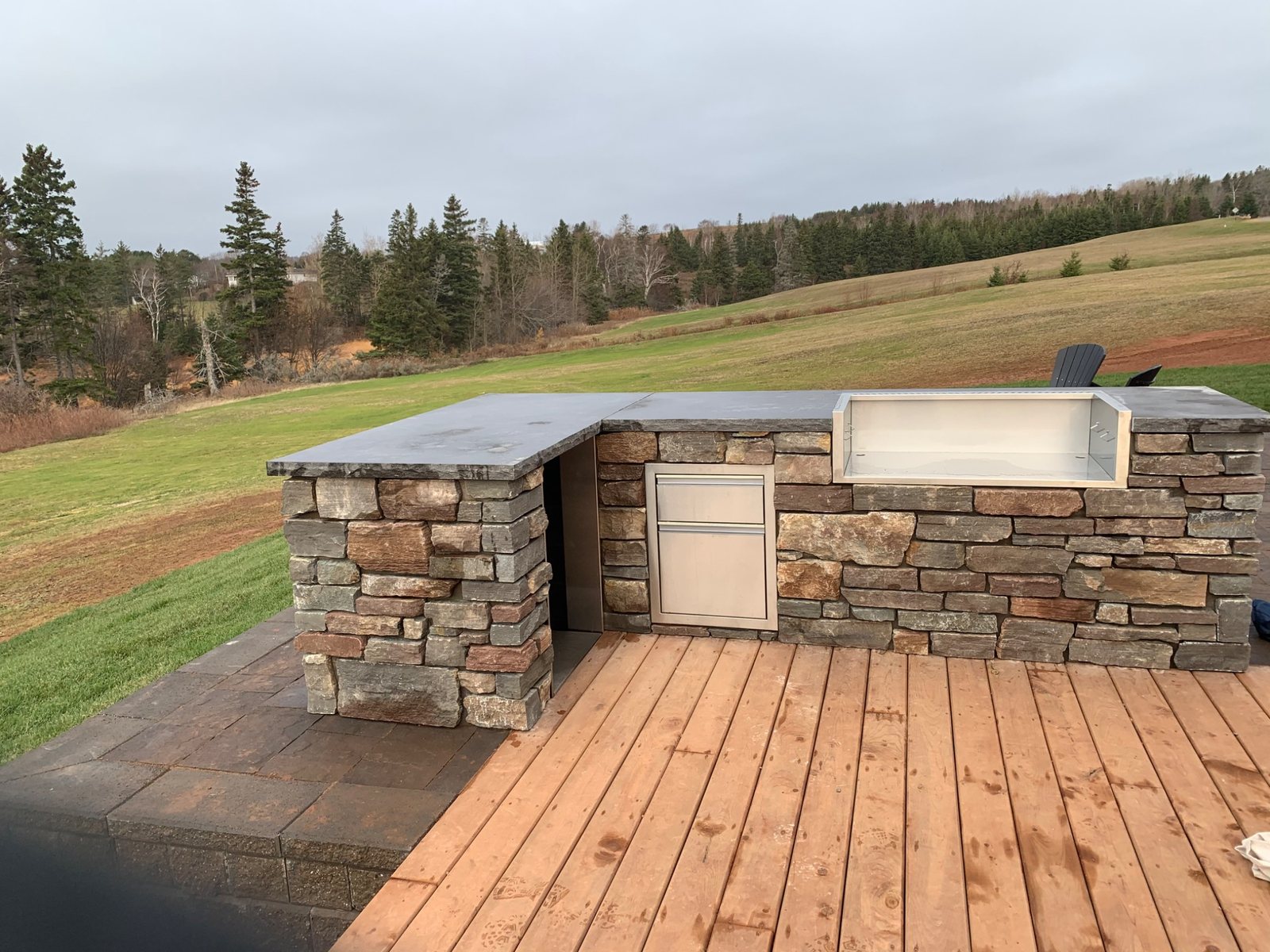 Outdoor stone masonry project showing natural stone used in an exterior landscape setting