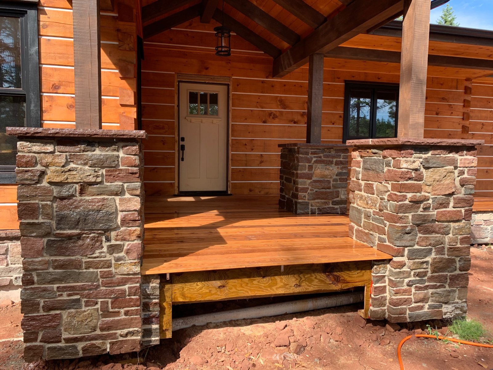 Natural stone masonry wall showing varied stone sizes and intentional jointing
